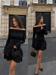 Female model wearing a black Off-Shoulder Mini Dress with a ruffled skirt